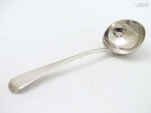 A Victorian silver old English pattern sauce ladle