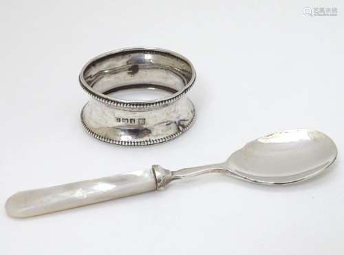 A silver jam / preserve spoon with mother of pearl