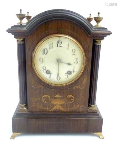 An inlaid rosewood bracket clock: A late 19thC