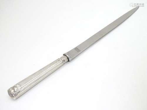 A silver handled paper knife 8 1/2'' long