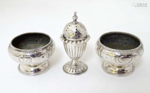 A silver plate pepperette together with a pair of