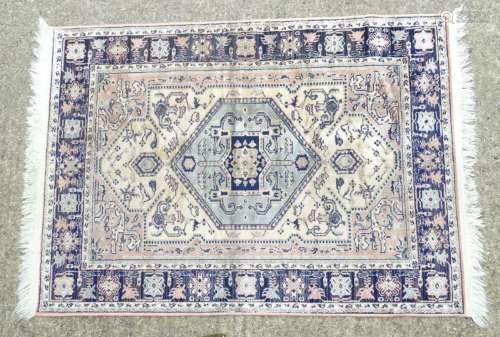 Carpet / Rug: a hand woven silk rug with central