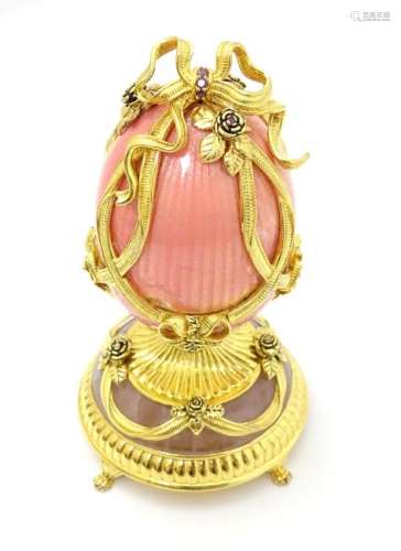 Franklin Mint : A silver gilt model of a Faberge egg '