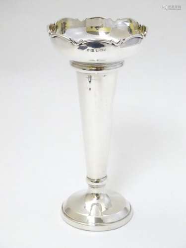 A silver vase hallmarked Sheffield 1968 maker James