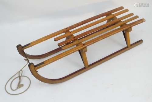 A vintage Davos Germina wooden sledge/toboggan by VEB