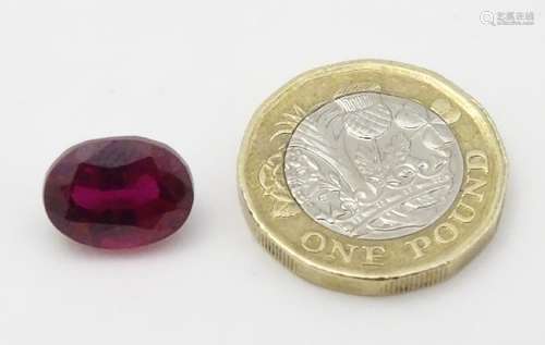 Unmounted stone: A red oval cut Ruby. approx 8.20 ct,