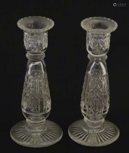Glass : a pair of cut glass candlesticks with hobnail