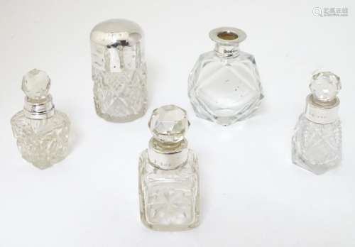 5 assorted glass scent bottles, some with silver