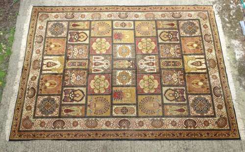 Rug / Carpet: a large handmade woollen carpet, having