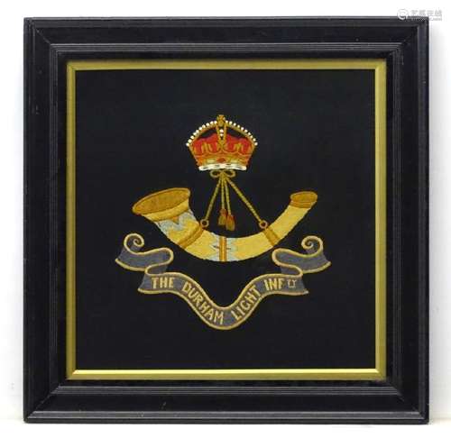 Militaria : An early 20thC framed embroidered banner of