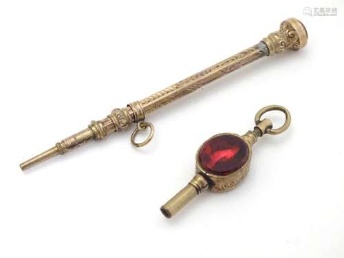 A 19thC gilt metal pocket watch key 1/2'' long set with