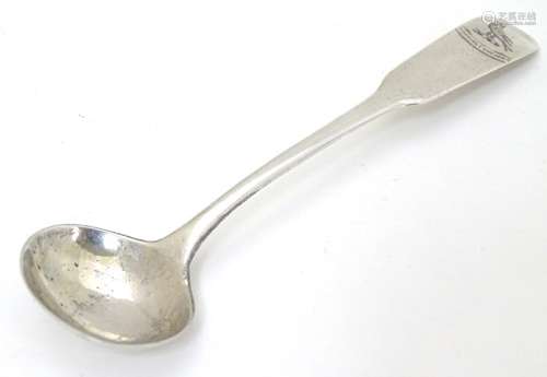 A Scottish silver fiddle pattern salt spoon hallmarked