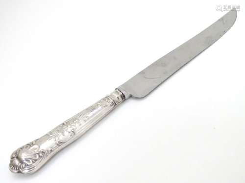 A silver handled cake knife 10 1/2'' long