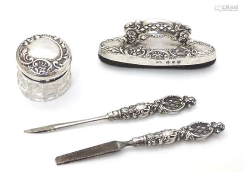 Manicure items comprising silver handled tools, buffer