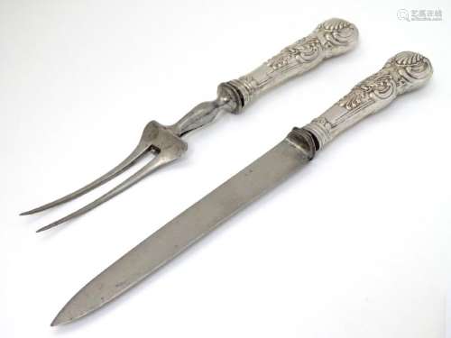 Carving knife and fork with white metal Queens pattern