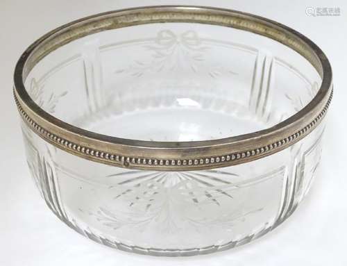 A circa 1900 silver plate rimmed glass bowl , with star