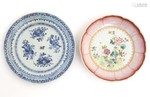 An 18thC Chinese blue and white plate decorated with