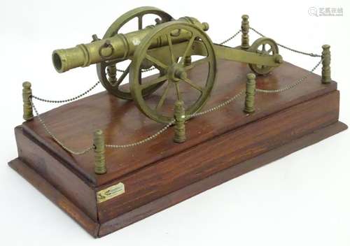 Militaria: a late 20thC model cannon, of brass