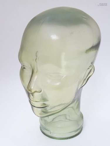 A mid- late 20thC Aqua-glass head, used for hat / wig