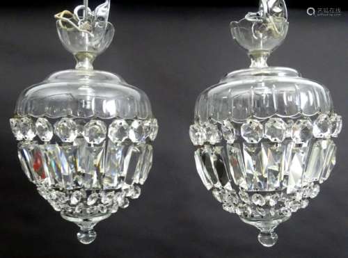 A pair of crystal facet cut glass electric and chrome