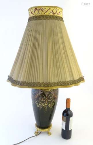 An early 20thC ceramic electric table lamp with ormolu