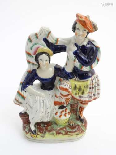 A Victorian Staffordshire pottery figural group of a