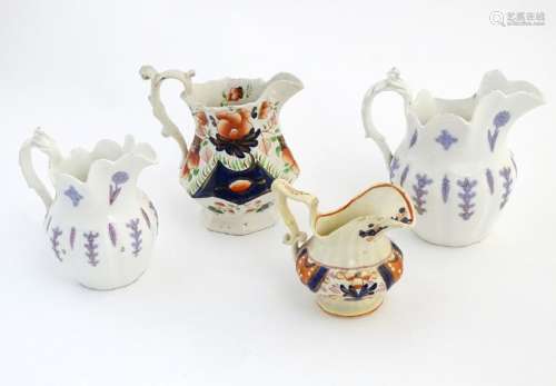 Four assorted Victorian jugs, two with floral /