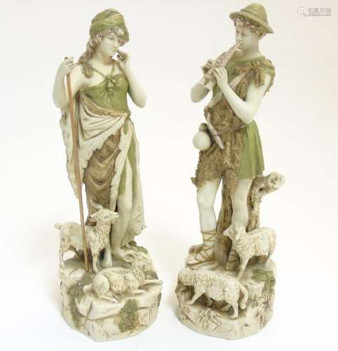 A pair of early 20thC Royal Dux Bohemia figures