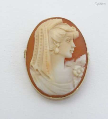 A Cameo brooch depicting a lady in side profile, within