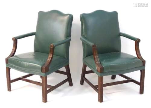A pair of Gainsborough style open armchairs with