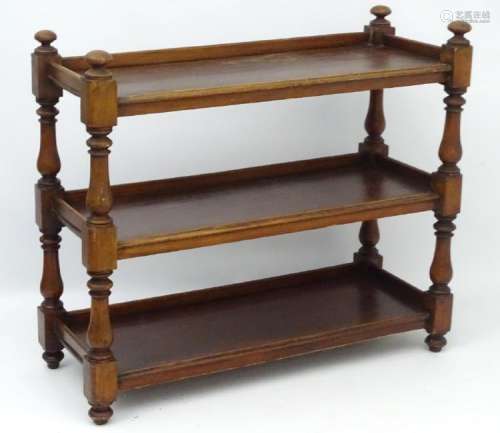 A mid / late 19thC mahogany three tier buffet, standing