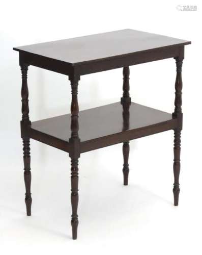 A late 19thC mahogany Aesthetic Movement two tier side