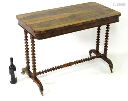 A mid / late 19thC rosewood table with turned supports