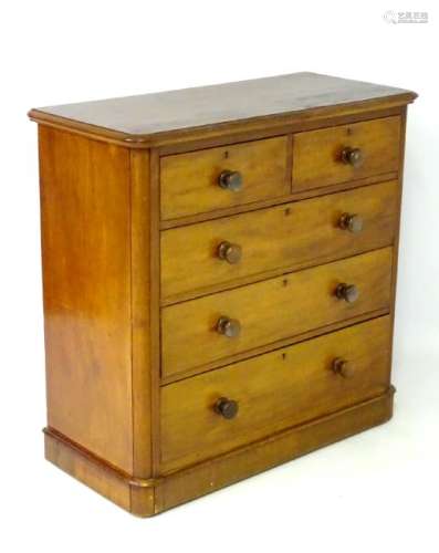 A Victorian mahogany chest of drawers, comprising two