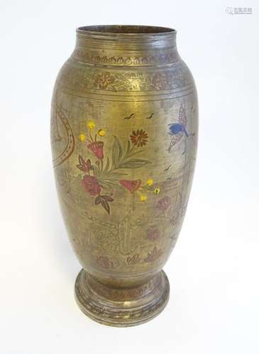 French Art Nouveau: a tall brass vase with coloured