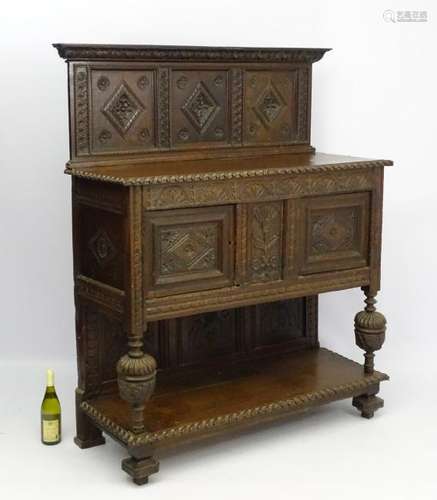 A 17thC and later oak court cupboard , with panelled