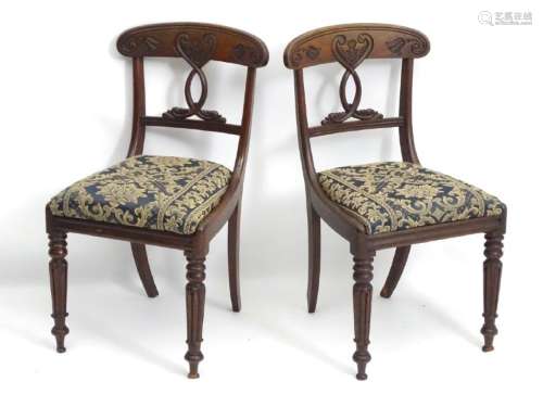 A pair of early / mid 19thC mahogany chairs, having a