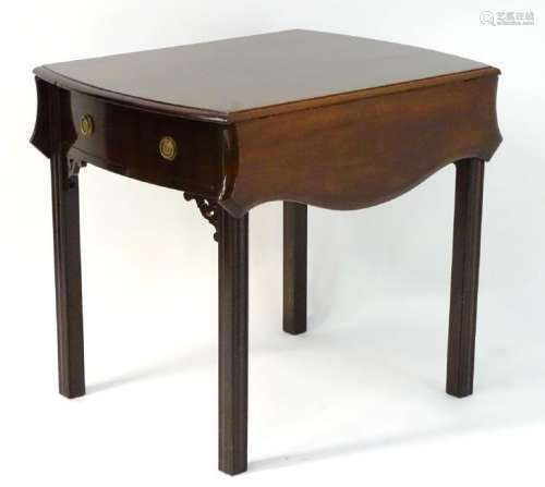 A mid / late 20thC mahogany butterfly pembroke table,