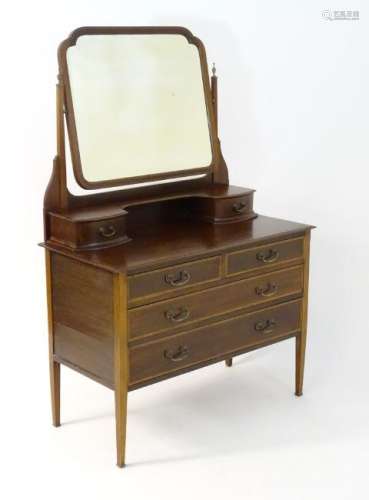 An early 20thC mahogany dressing table, having a