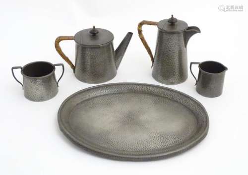 Arts and Crafts: a 4 piece pewter tea service by