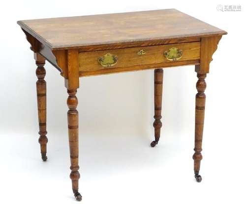 A late 19thC Ash pembroke table with a single long