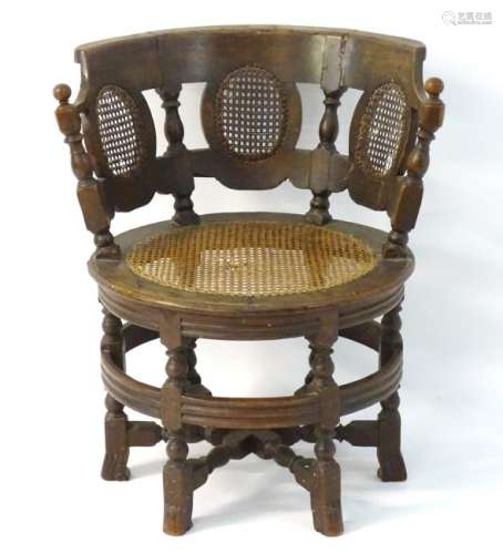 A late 18thC oak Burgomeister chair, with a circular