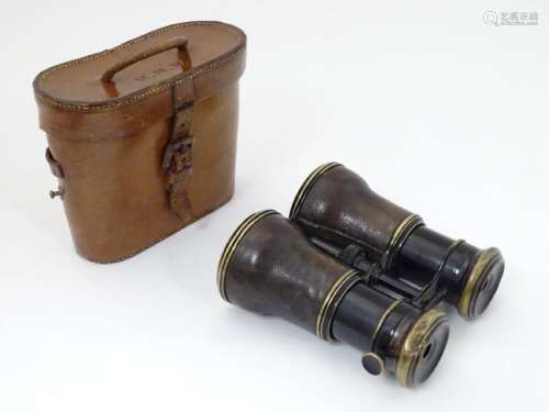 A cased pair of WWI-era French multi-use binoculars, of