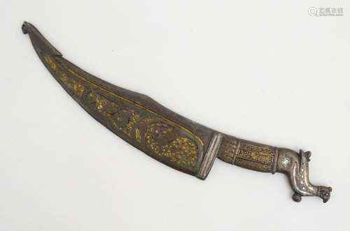 A Persian ceremonial bronze dagger with inlaid silver