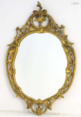 A Chippendale style giltwood mirror. 25'' wide x 29''