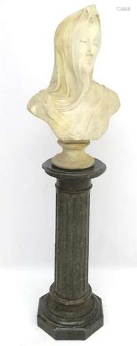 A 19thC fluted granite column and base surmounted by a