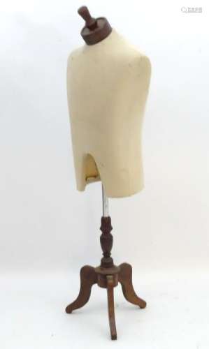 Dressmakers dummy : an adjustable height  mannequin on