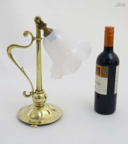 Art Nouveau: a brass table lamp with vaseline glass