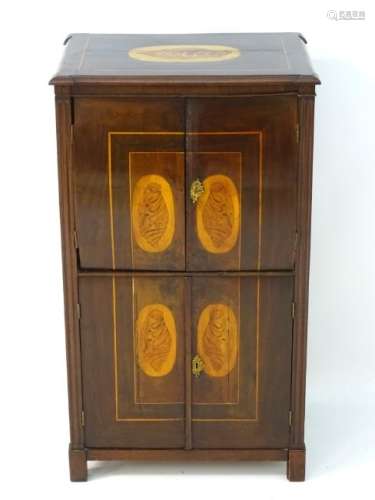 A Dutch 19thC mahogany and marquetry music cabinet,