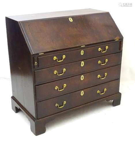 A late 18thC mahogany bureau with fall front containing